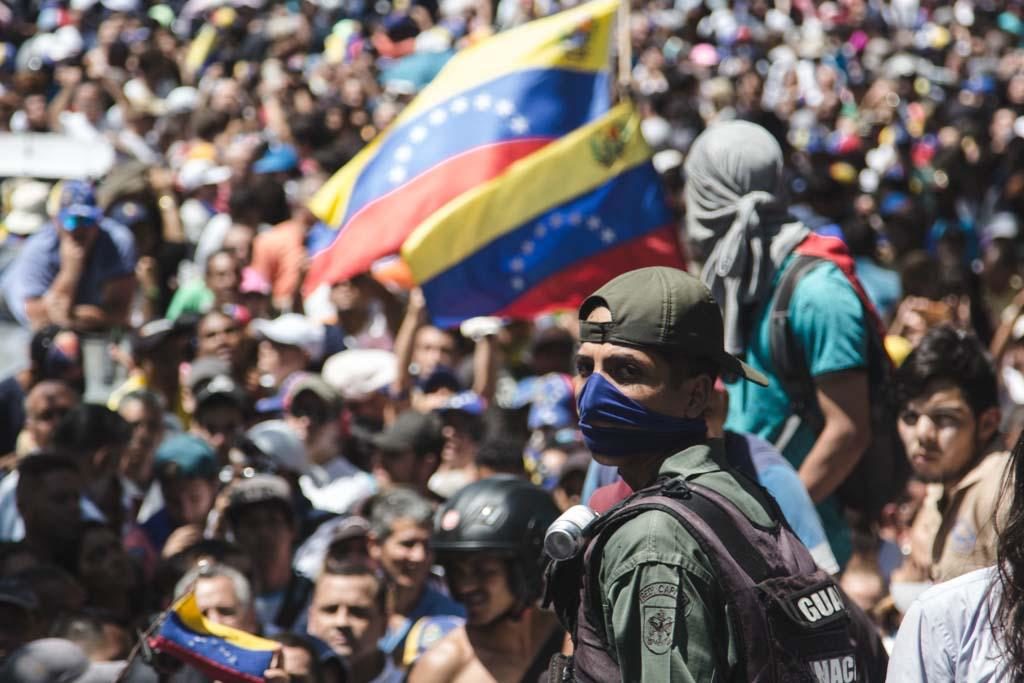 Soldier wearing blue bandana supports Juan Guaido