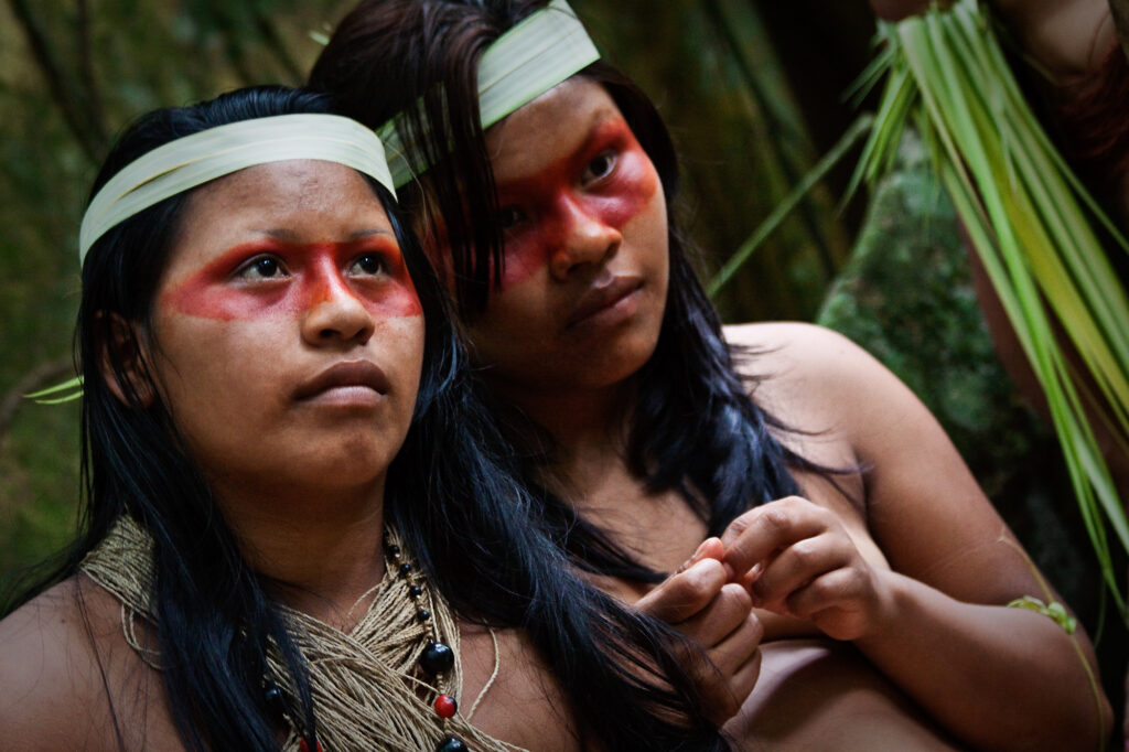 Indigenous Waorani girls in the Amazon Rainforest.